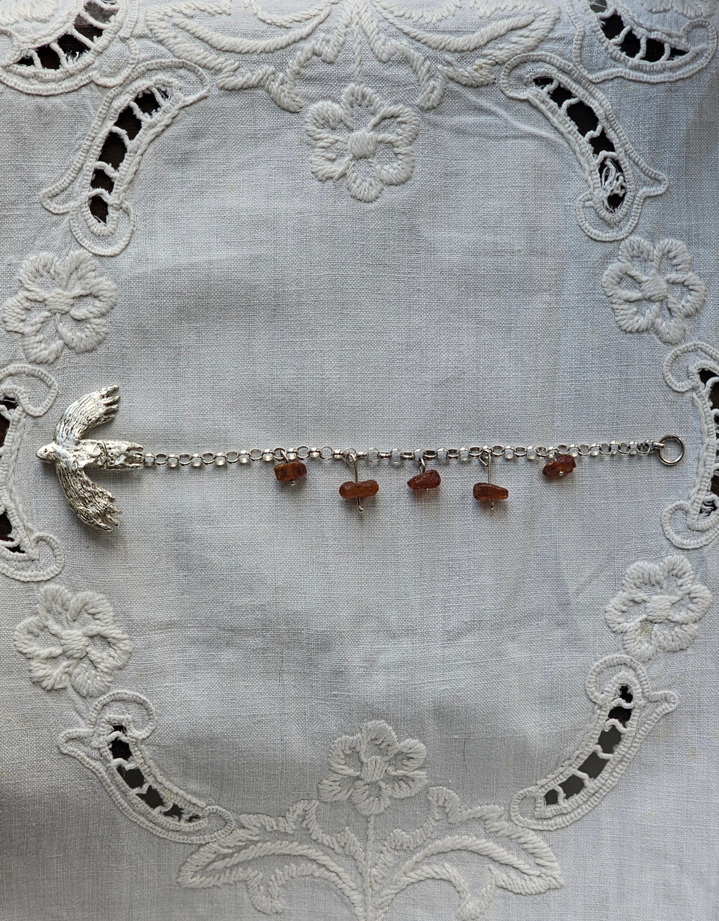 wild bird bracelet with ambers