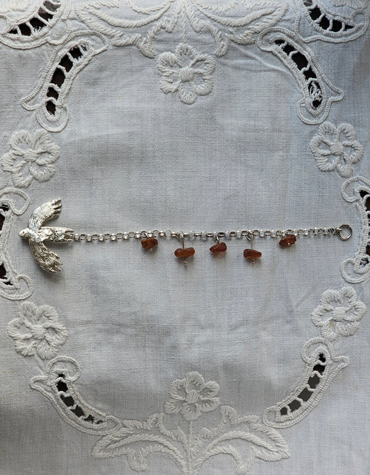 wild bird bracelet with ambers